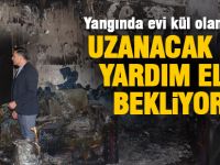 Yangında evi kül olan aile yardım bekliyor